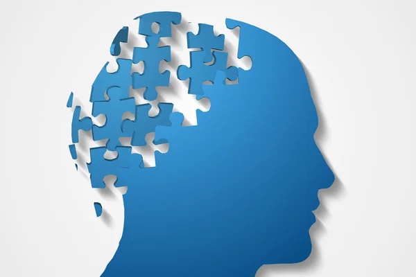 Blue jigsaw head with missing pieces — Stock Photo, Image