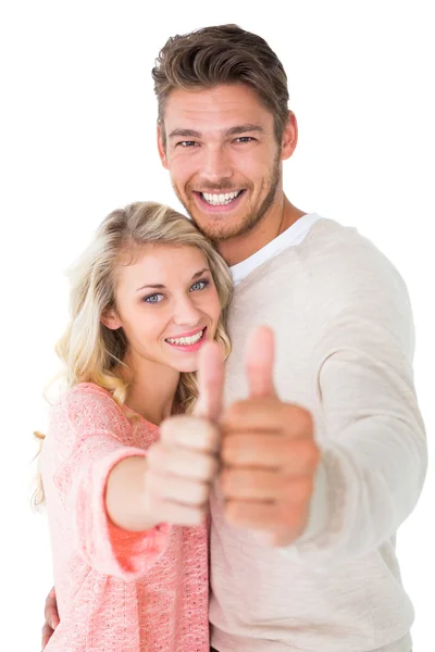 Atraktivní pár zobrazeno palec nahoru fotoaparát — Stock fotografie
