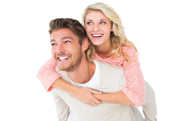 Bonito homem dando porquinho de volta para sua namorada — Fotografia de Stock