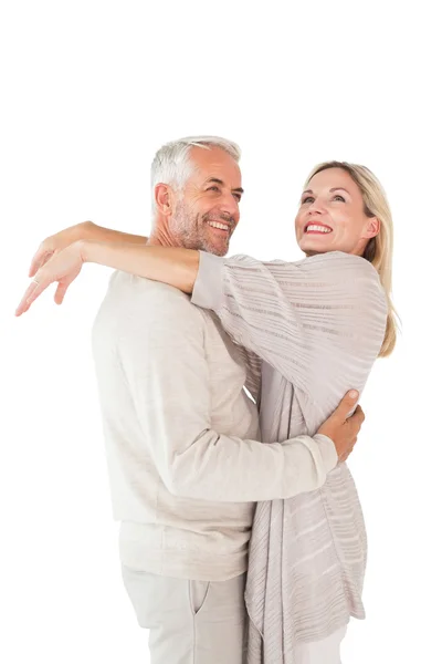 Happy couple standing and hugging — Stock Photo, Image