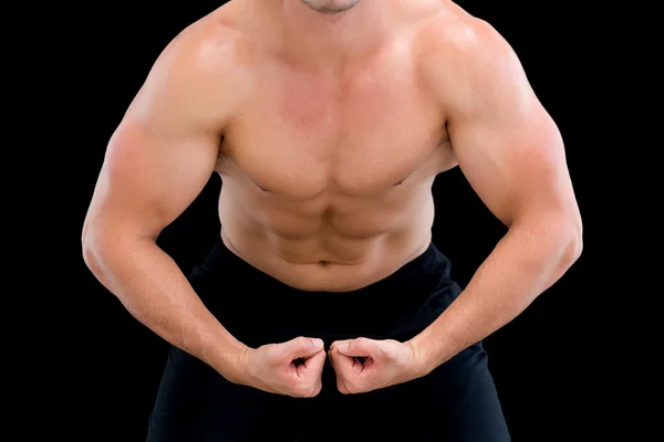 Mid section of a shirtless muscular man — Stock Photo, Image