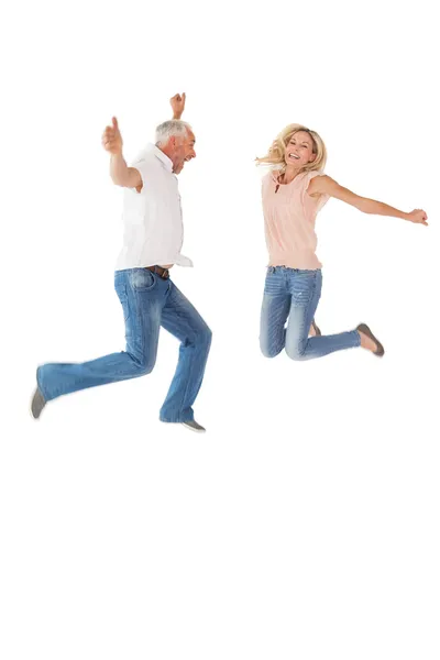 Excited couple cheering and jumping — Stock Photo, Image