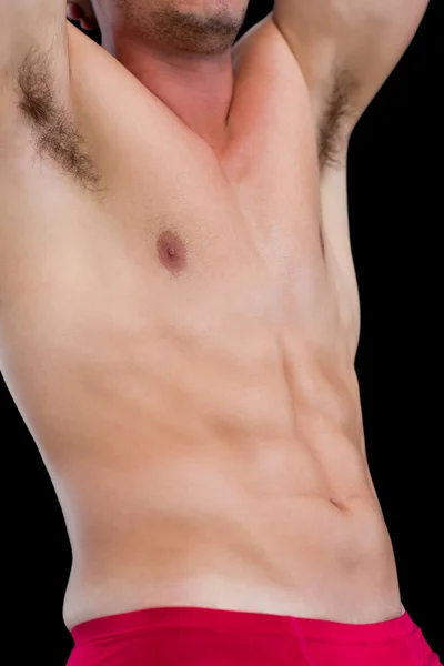 Mid section of a shirtless muscular man — Stock Photo, Image