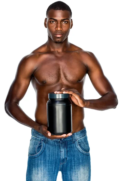 Sporty man holding protein drink — Stock Photo, Image