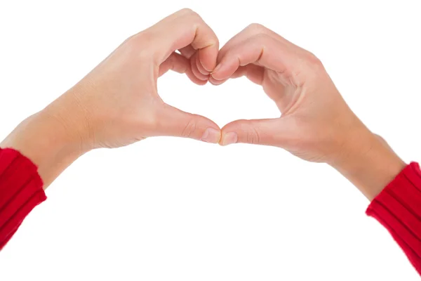 Woman making heart shape with hands — Stock Photo, Image