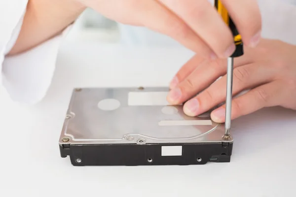 Technician working on broken hardware — Stock Photo, Image