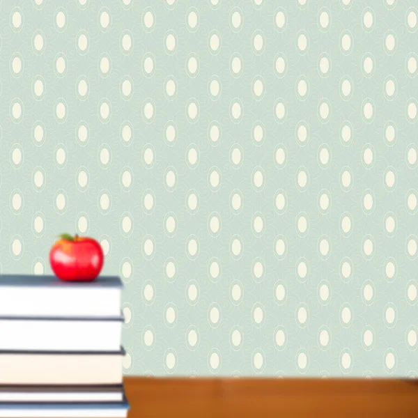 Rode appel op stapel boeken — Stockfoto