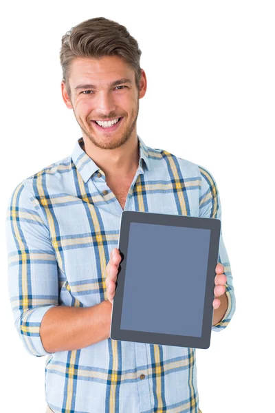 Schöner junger Mann zeigt seinen Tablet-PC — Stockfoto