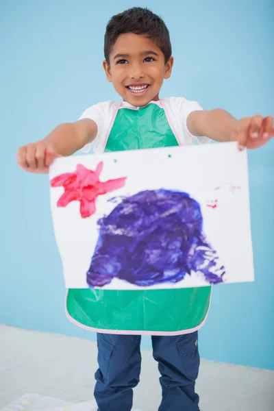 Little boy showing his painting in classroom — Stock Photo, Image