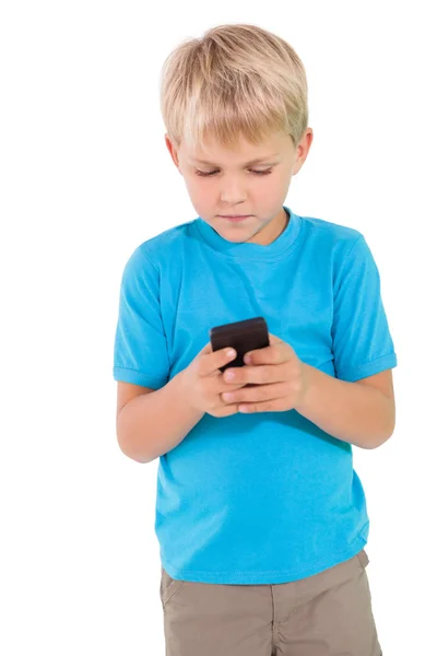 Netter kleiner Junge mit Smartphone — Stockfoto