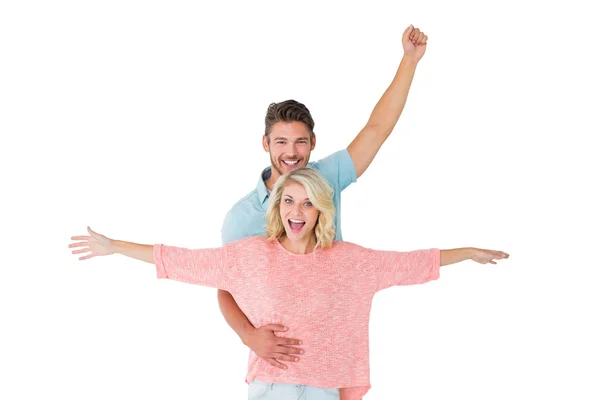 Atractiva pareja sonriendo y animando — Foto de Stock