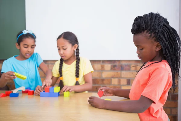 Pupils playing with building blocks — Stock Photo, Image