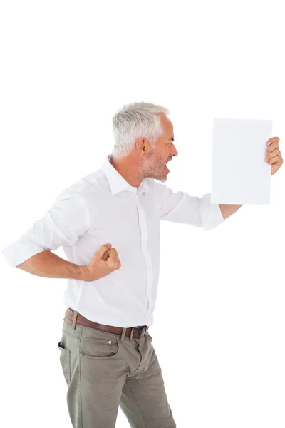 Angry man shouting at piece of paper — Stock Photo, Image