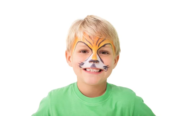 Happy little boy in tiger face paint Stock Photo