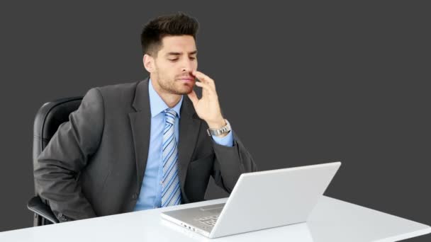 Businessman working at his desk — Stock Video