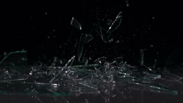 Glass falling and smashing into pieces — Stock Video