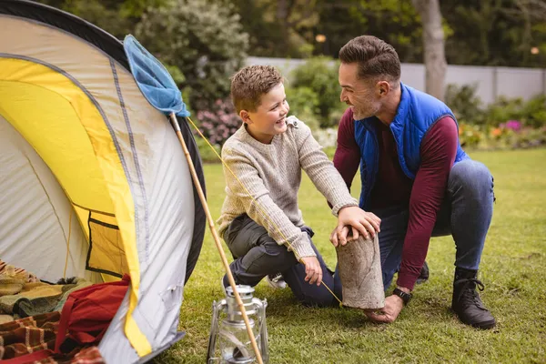 Caucasian Father Son Smiling While Setting Tent Together Garden Fatherhood — Stock Photo, Image