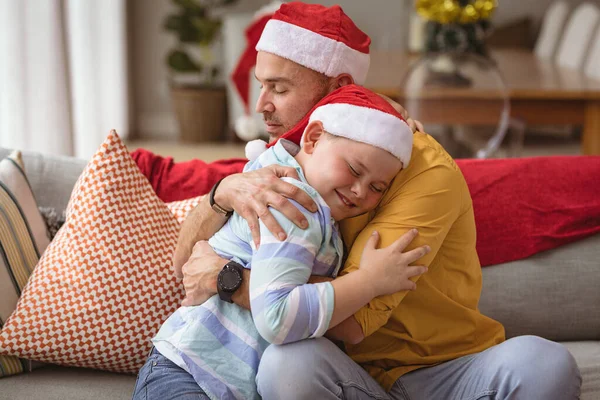 Caucasian Father Son Hugging Each Other Sitting Couch Home Christmas — Stock Photo, Image