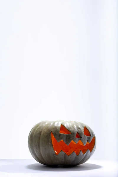 Composition Lit Scary Halloween Carved Green Pumpkin Copy Space White — Stock Photo, Image