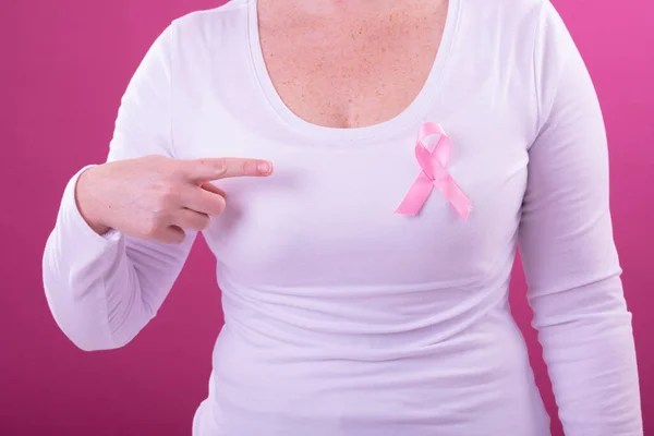 Midsection Woman White Tshirt Pink Ribbon Gesturing Breast Cancer Positive — Stock Photo, Image