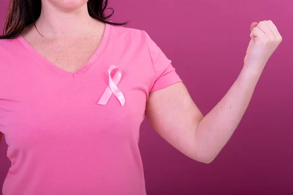 Midsection Woman Pink Tshirt Ribbon Clenched Fists Breast Cancer Positive — Stock Photo, Image