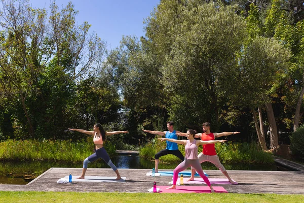 Men Woman Exercising Trees Yoga Session Park Healthy Lifestyle Body — Zdjęcie stockowe