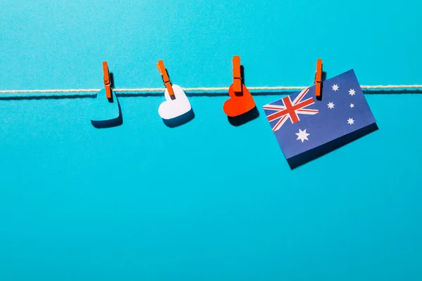 Heart Shapes Australia Flag Hanging Clothesline Copy Space Blue Background — Stock Photo, Image