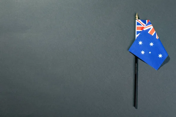 Stars Union Jack Australia Flag Stick Copy Space Black Table — Stock Photo, Image