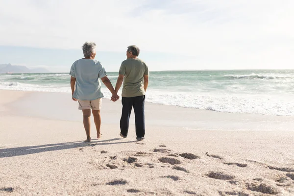 Full Length Rear View Multiracial Senior Couple Holding Hands Walking — Stock Photo, Image