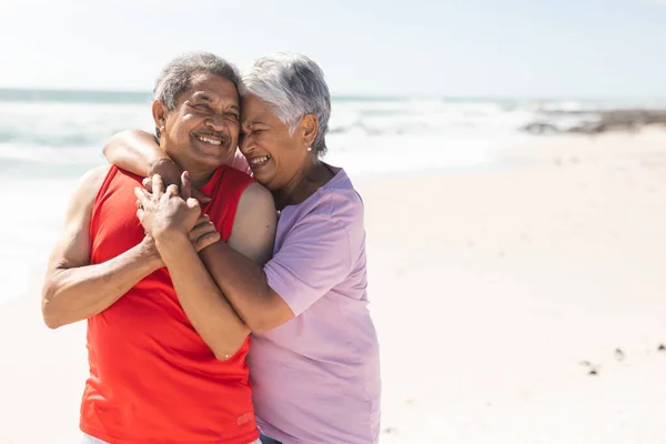 Cheerful Biracial Senior Woman Embracing Man Beach Sea Sunny Day — Stock Photo, Image