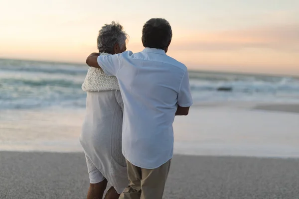 Rear View Biracial Senior Man Walking Arm Woman Beach Sunset — Stock Photo, Image