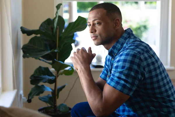 Thoughtful Young African American Man Sitting Hands Clasped Home People — Stock Photo, Image