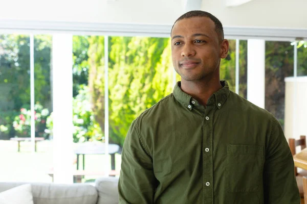 Thoughtful Young African American Man Looking Away While Standing Living — Stock Photo, Image