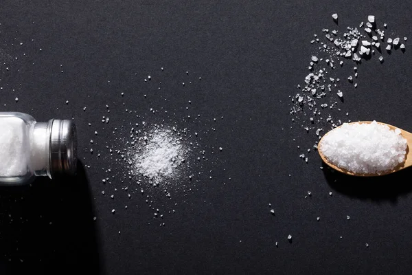 Directly Shot Salt Shaker Spoon Fallen Salt Black Table Unaltered — Stock Photo, Image