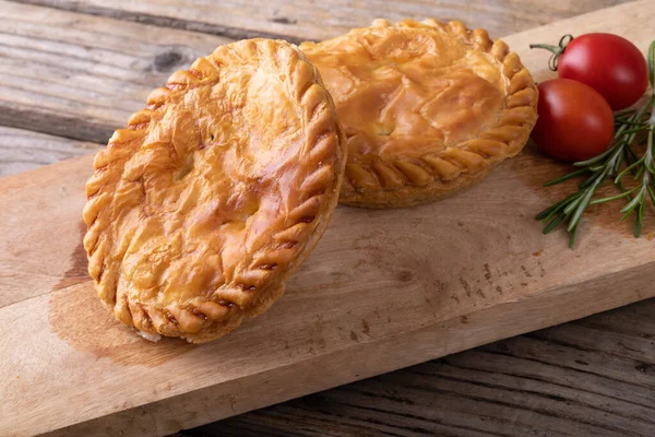 Close Stuffed Pies Tomatoes Rosemary Served Wooden Serving Board Table — Stock Photo, Image