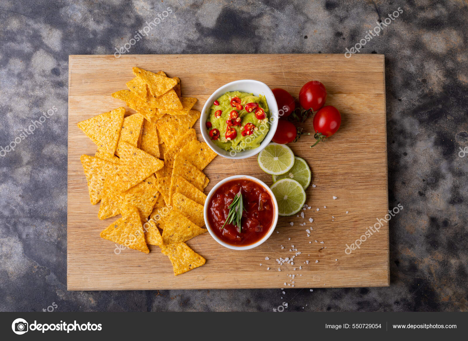 Overhead View Nacho Chips Dipping Sauces Tomatoes Limes Served Serving Stock Photo by