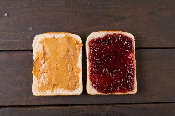 Directly Shot Bread Slices Peanut Butter Preserves Wooden Table Unaltered — Stock Photo, Image