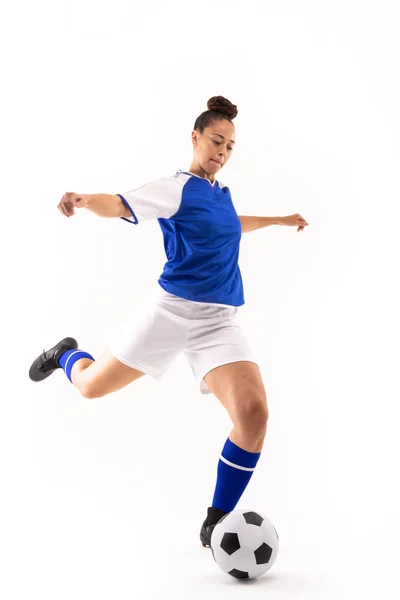 Full Length Biracial Young Female Player Arms Outstretched Kicking Ball — Stock Photo, Image