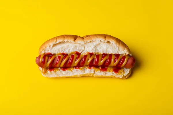 Close Hot Dog Yellow Background Unaltered Unhealthy Food Meat Bread — Stock Photo, Image