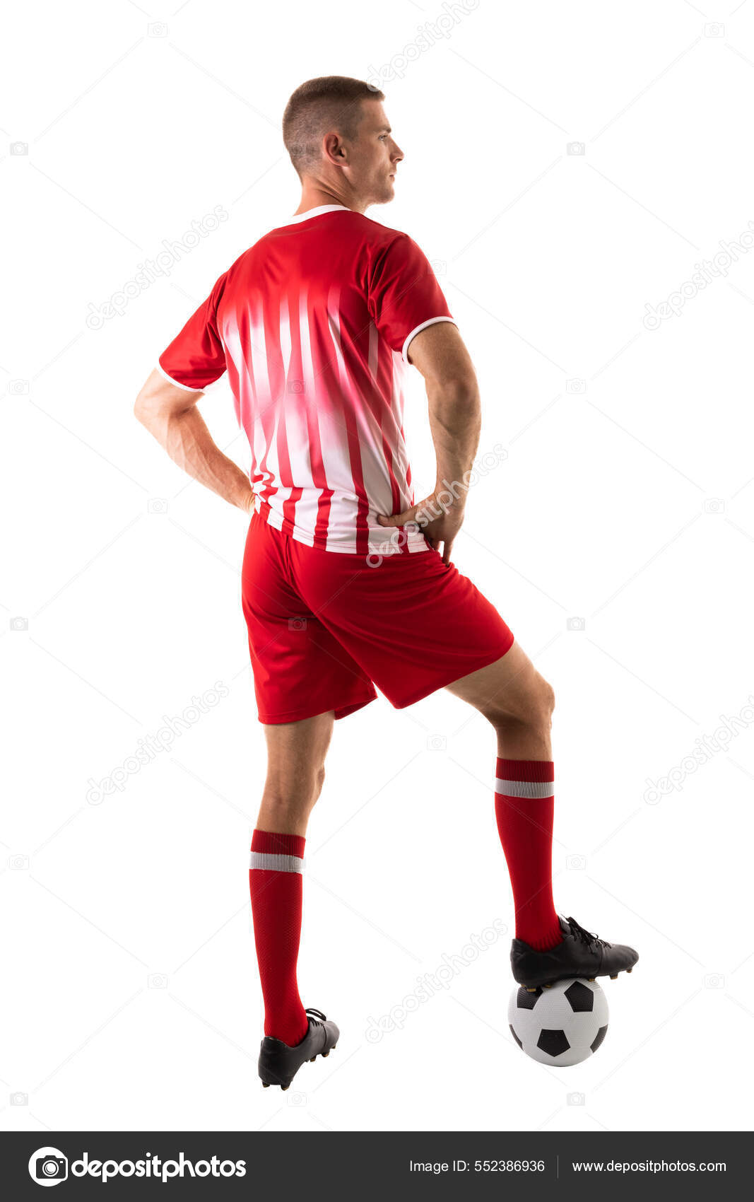 Full Length Rear View Young Male Soccer Player Stepping Ball - Main Image