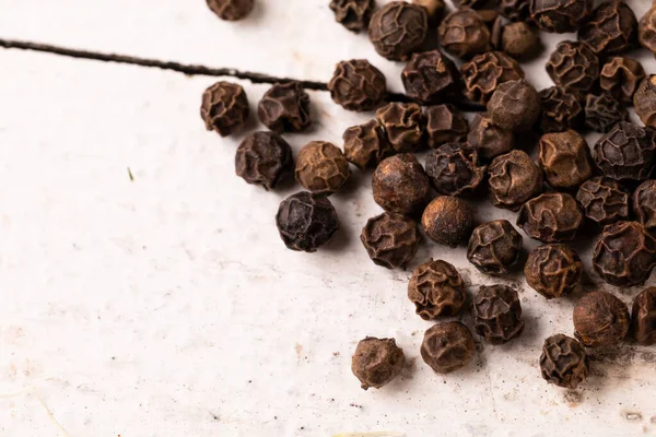 High Angle View Black Pepper White Table Copy Space Unaltered — Stock Photo, Image