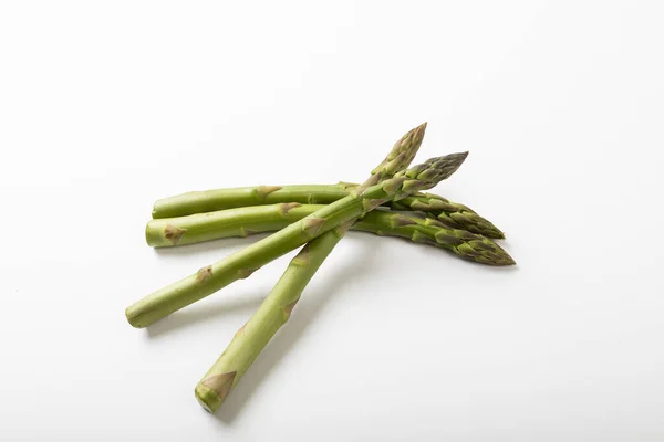 Close Raw Green Asparagus White Background Copy Space Unaltered Food — Stock Photo, Image