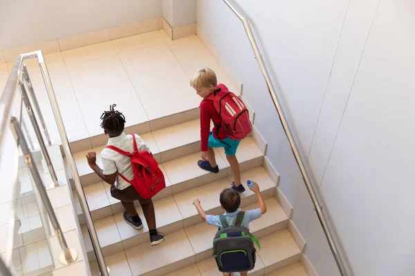 High Angle View Multiracial Elementary Schoolboys Backpack Climbing Steps School — Stock Photo, Image