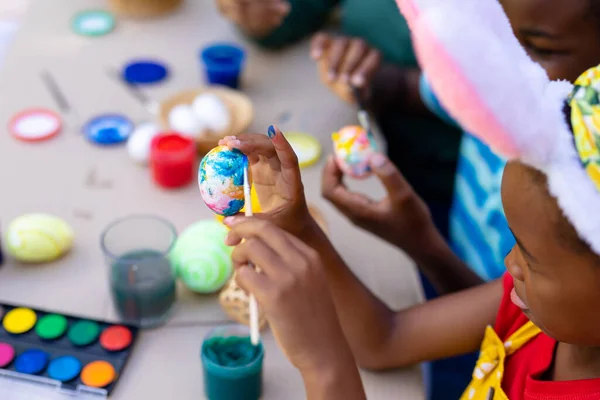 African American Girl Wearing Bunny Ears Painting Egg Family Easter — Stock Photo, Image