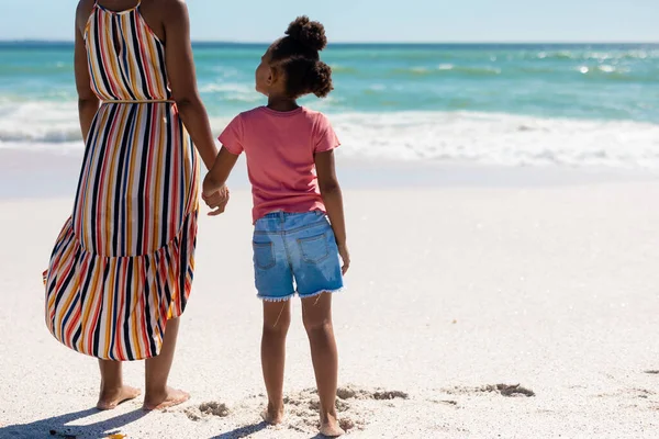 African American Girl Holding Hand Mother While Standing Together Beach — Stock Photo, Image