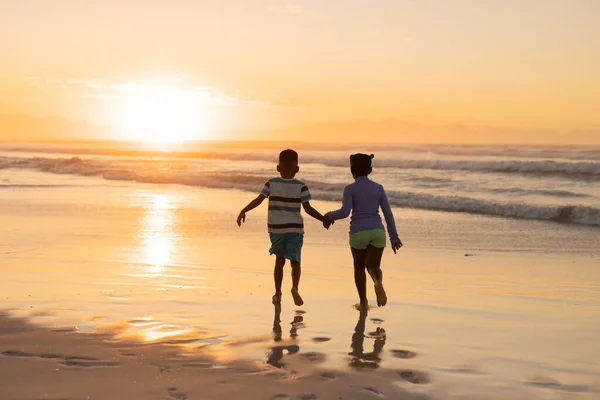 Rear View African American Siblings Holding Hands Running Beach Sky — Stock Photo, Image