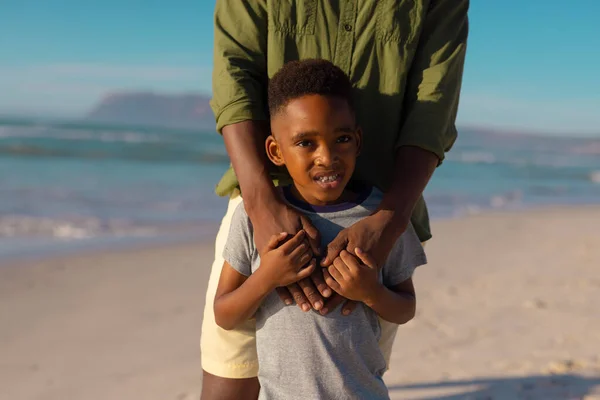 Midsection African American Young Man Holding Son Hands While Standing — Photo