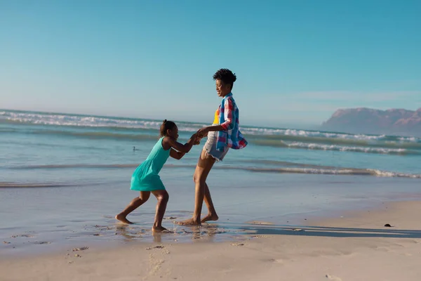 Side View African American Young Woman Holding Daughter Hands Playing — ストック写真