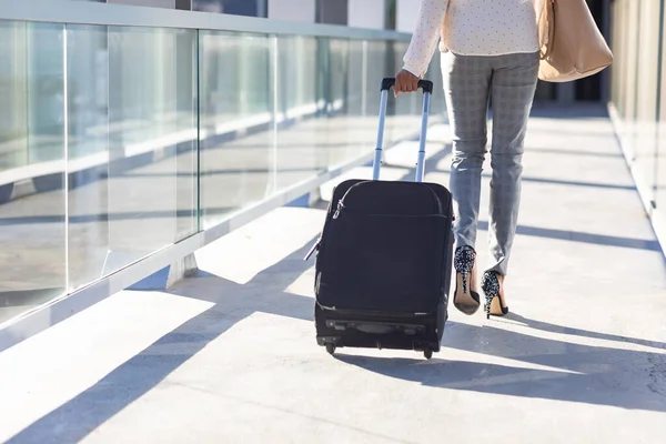 Low Section Young Biracial Businesswoman Walking Luggage Corridor Airport Sunny — Stock Photo, Image