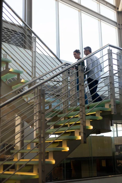 Low Angle View Caucasian Colleagues Planning While Moving Staircase Modern — Stock Photo, Image